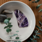 The energy of Amethyst is calming and peaceful. The stone is often used in meditation practices. As a facial tool, it soothes inflamed skin and promotes relaxation.  Gua Sha is a healing modality from traditional Chinese medicine. Facial Gua Sha is a gentle technique for delicate areas. 