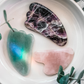 Jade stone is a traditional choice for Gua Sha practice due to its healing potential. It's known as a tool of emotional healing, spiritual work, and connecting with higher realms. Jade helps with courage, self-confidence, and self-acceptance.